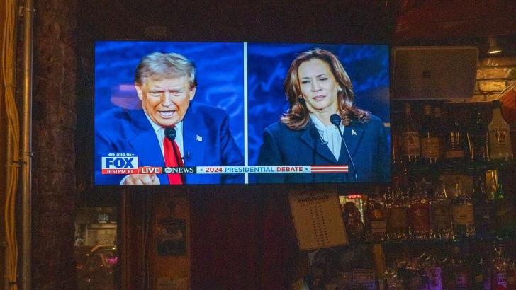 US election debate on TV in bar
